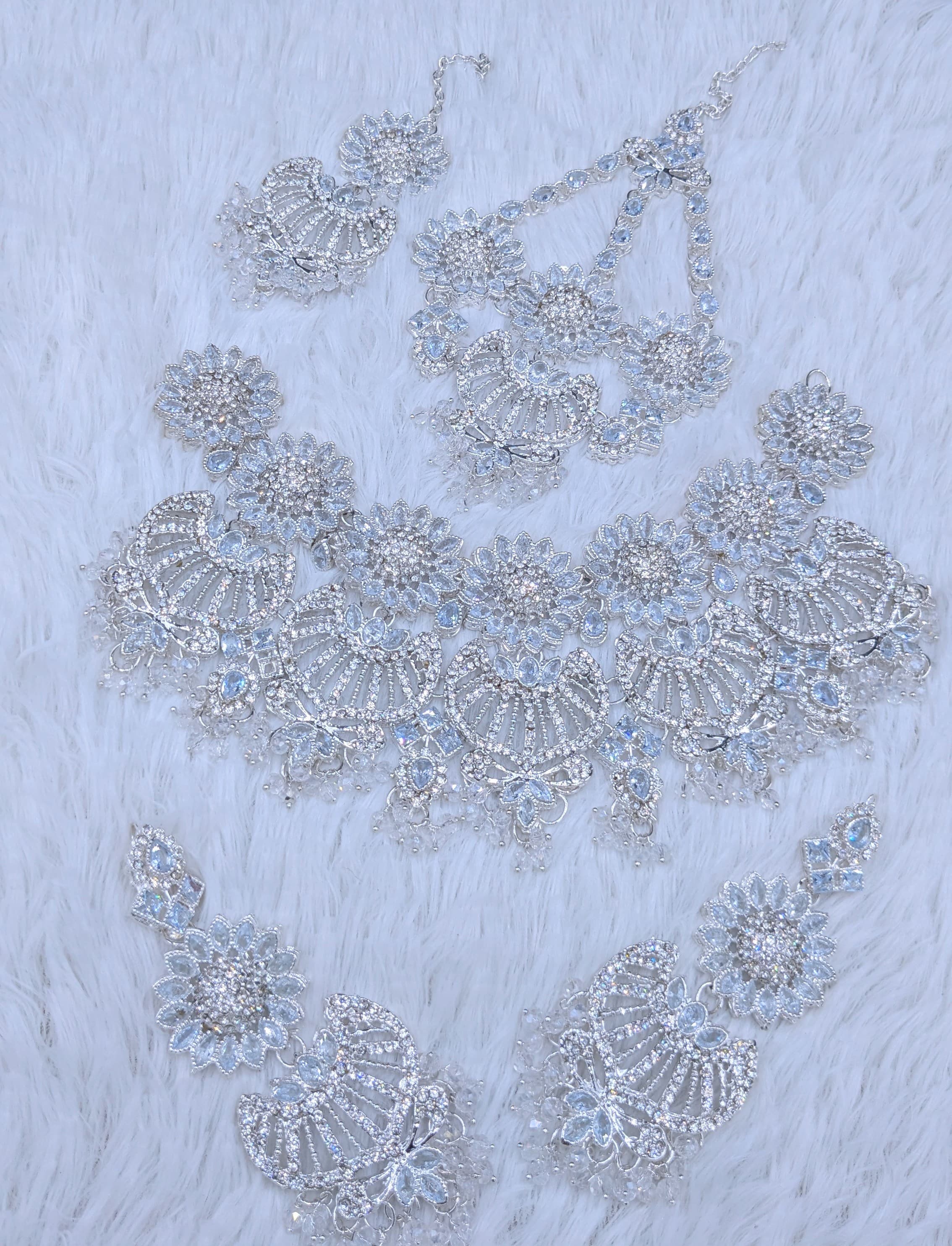 Beautiful Bridal set 
Zarqon &  Polki Work 
With Tikka & Jummar